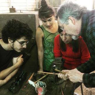 metalsmith Kevin O'Dwyer teaching students at his workshop.