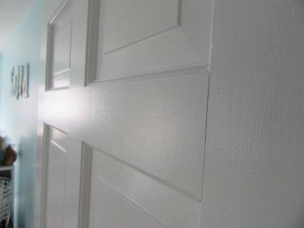 6 panel door painted white with no brush marks.