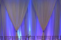 Specialty lighting and pipe draping at wedding reception in Bay St. Louis MS