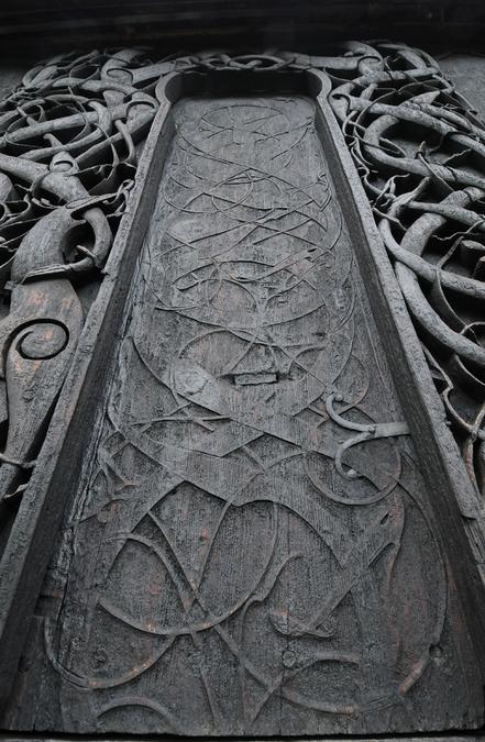 Wood carved detail. Urnes Stave church. Photography by Kevin O'Dwyer