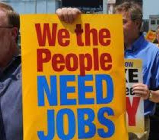 We Need Jobs signs unemployeed people