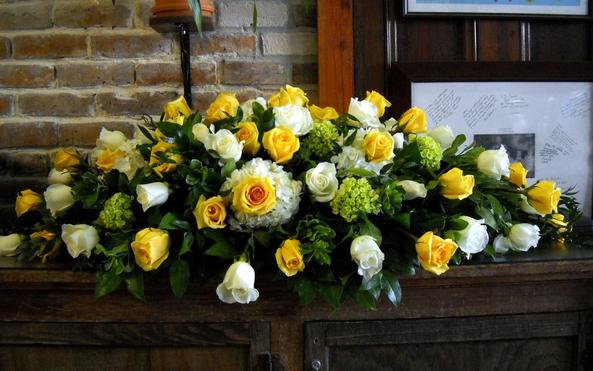 Large spray with yellow and white roses, white and green hydrangea, Italian ruscus and pittosporum