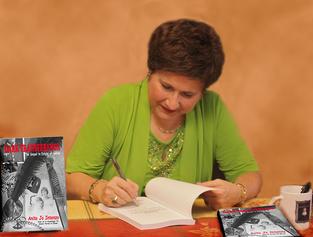 Author and Allined Books Co-Owner signs DARK TRANSFERENCE