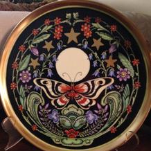 Night Moth by Irene Graham accented with raised enamel work and gold