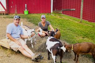 George and Cinda Malouin with Nigerian Dwarf goats at my peeps farm.