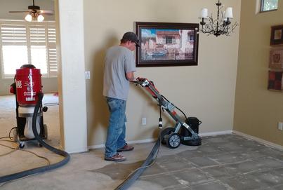 Dust free tile removal contractor sanding down thinset