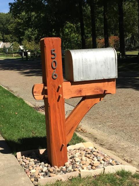 Mailbox post built using a pegged & double-wedged anchorbeam tenon using black cherry timers.