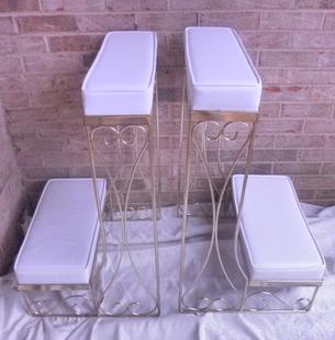 White leather wedding kneeling benches with gold trim for rent for your wedding at Rent Your Event, LLC near Charlotte, North Carolina.