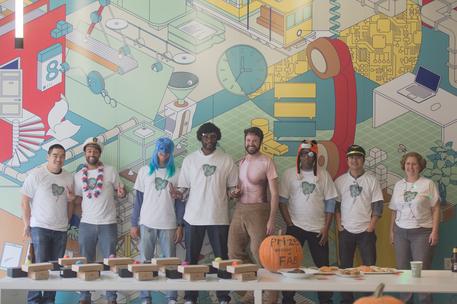 group of tech workers in costume contest