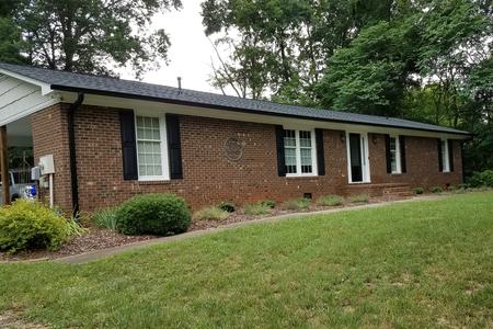 Black gutters and downspouts installed Mebane NC 27302