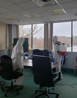 disinfecting office area.