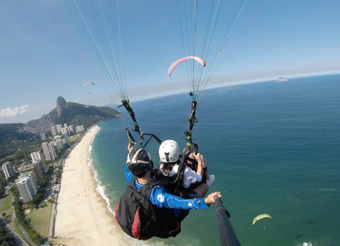 Paraglider flying over São Conrado beach, Rio de Janeiro - Brazil