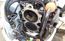 picture of evinrude etec 60 horse outboard with cylinder head removed