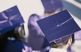 Image of people wearing graduation caps and gowns