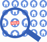 Picture of a magnifying glass hovering over house graphics representing searching for a home