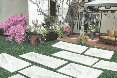 Anaqua Springs San Antonio with a beautiful mulched bed and a custom designed stone path with a porch and an awning