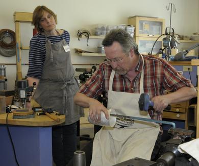 Metalsmith Kevin O'Dwyer teaching silversmithing during a workshop.