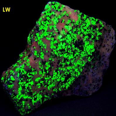 fluorescing Willemite, Hardystonite, Rhodonite, Franklinite, Calcite -Franklin Mine, Franklin, Franklin Mining District, Sussex County, New Jersey, USA