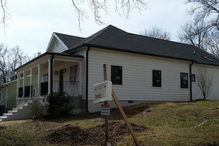 Dark Bronze 5 inch Seamless Gutter on Durham, NC Home Renovation
