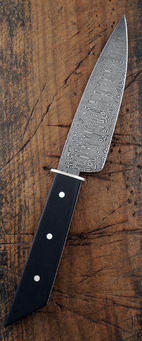 Damascus steel and ebony knife fabricated by bladesmith Kevin O'Dwyer.