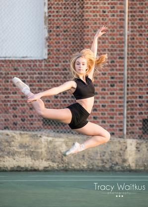 dancer leaping on a tennis court in Pismo Beach