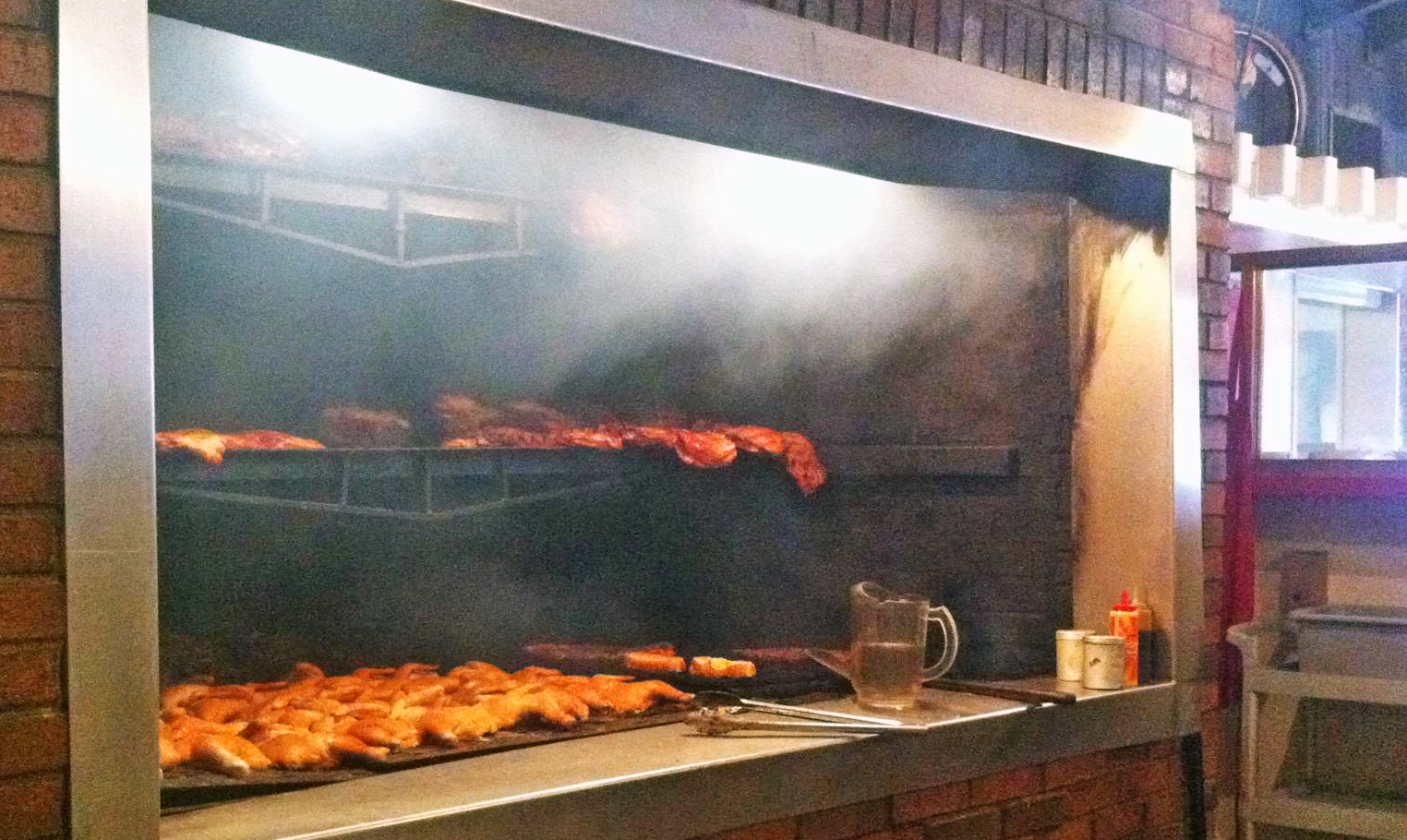 BBQ oven at work - Picture of Hillbilly's Barbeque & Steaks, Lowell -  Tripadvisor