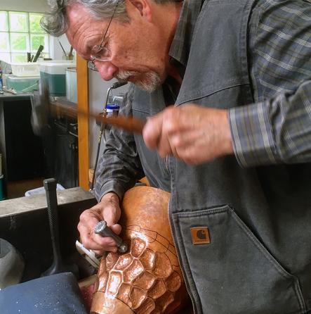 metalsmith Kevin O'Dwyer working in his workshop.