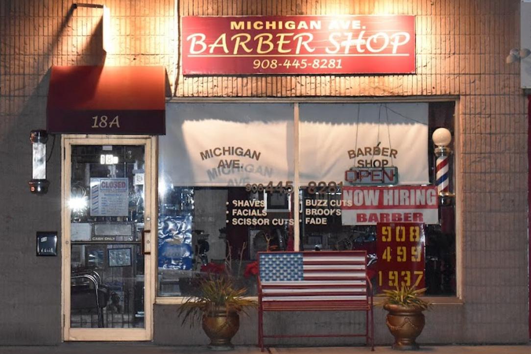 Outside view of the barber shop building.