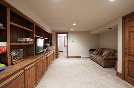 finished basement in Cherry Hills Village Colorado with custom cabinetry and custom doors