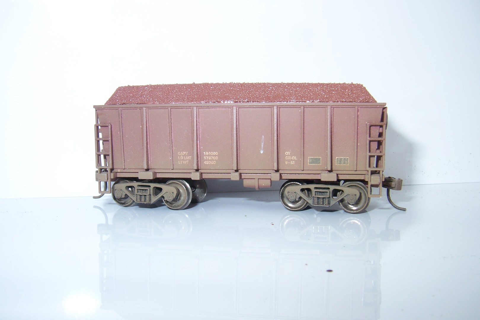 60 unpainted plastic loads. Iron Ore loads for Walthers ore cars 