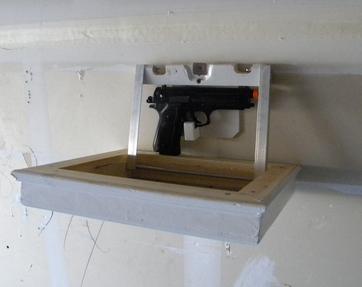 Secret hidden compartment Picture Frame Gun Safe. Frame folds down to reveal hidden hand gun. www.DIYeasycrafts.com