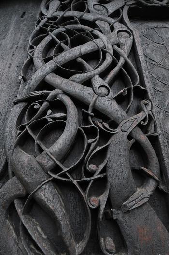 carved wood Hiberno-Urnes decorative panel at Urnes Stave Church.