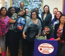 Colby's Army photo of volunteers with backpacks for the homeless