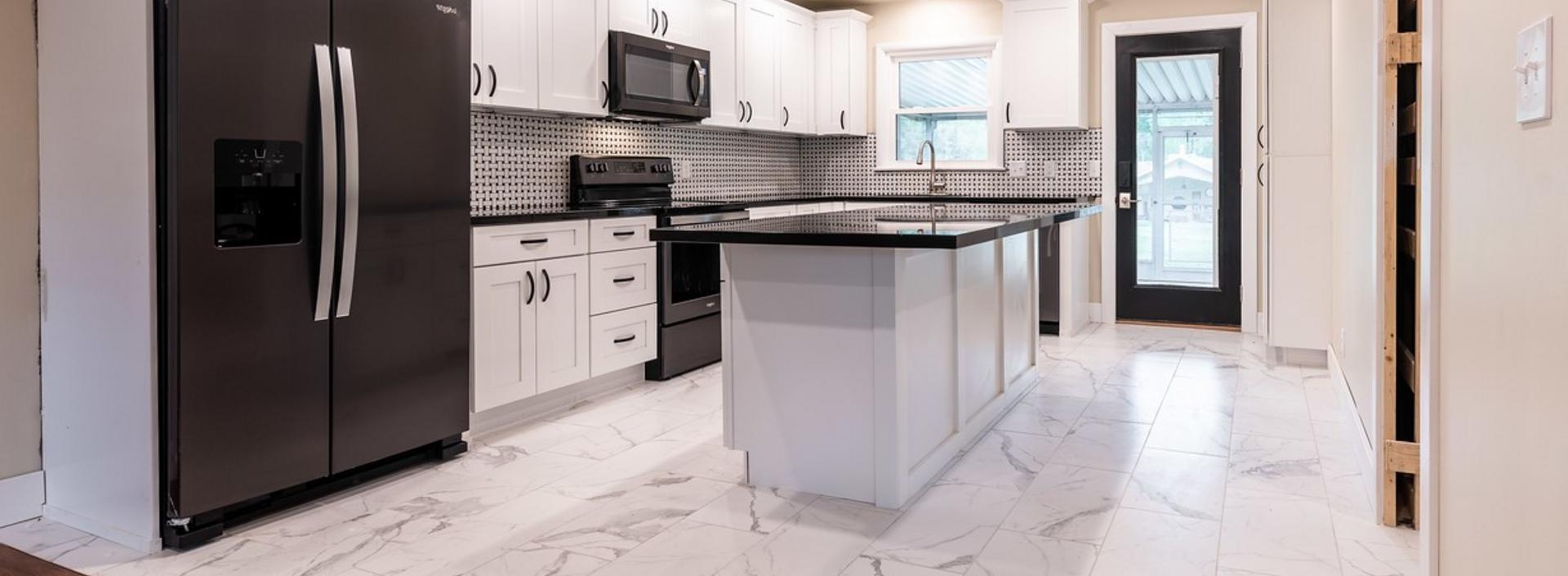 Black and white marble kitchen remodel by Creative Associates in Springfield
