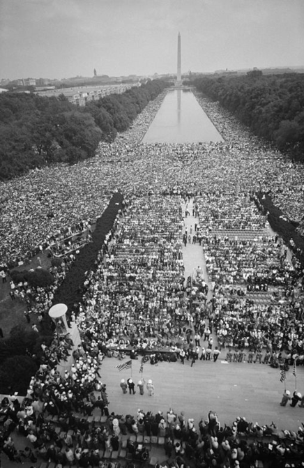 aerial view of 1963 civil rights rally around reflecting pool with Washington Monument in background