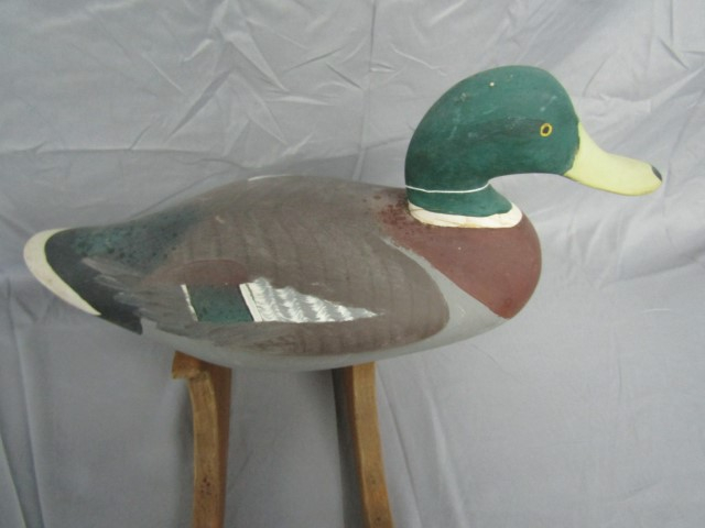 Sold at Auction: NICK TRAHAN MALLARD DRAKE DECOY Painted eyes. Carved bill.  Upswept tail. Branded JH N.O. LA. Minor gunning wear. Length 15. Prove