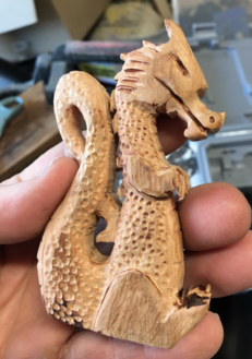 How to carve a Wood Dragon with a dremel grinder