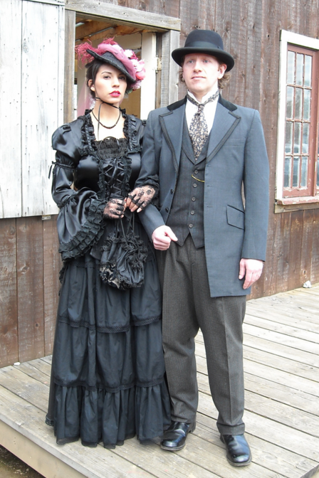 Old West 1880's couple on town street.