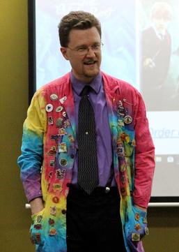 Kym in rainbow lab coat