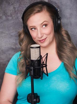 Haley, a female voice actor, in a recording session for a happy client!