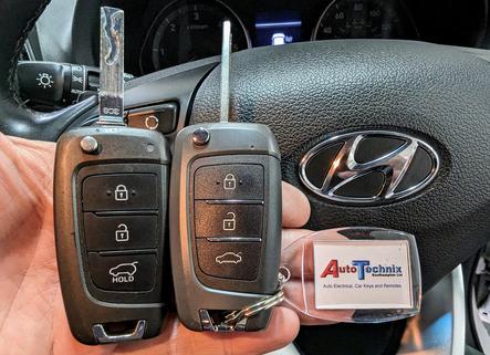 Two Hyundai remote flip keys