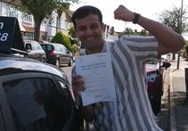 Rahman passing his driving test first time