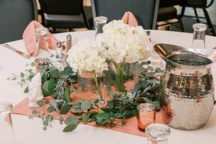 Altar arrangement filled with lush blooms