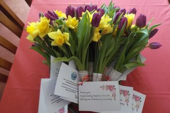 Flowers with notecards attatched