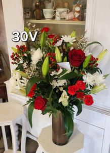 beautiful flower arrangement vase for valentines day with deep red roses, light red smaller flowers and white carnations and stargazer lillies and greenery in Helotes, TX