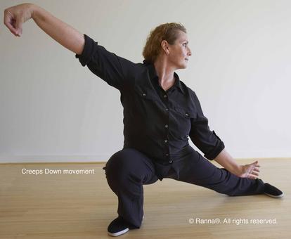 Ranna, instructor, demonstrating Tai Chi posture