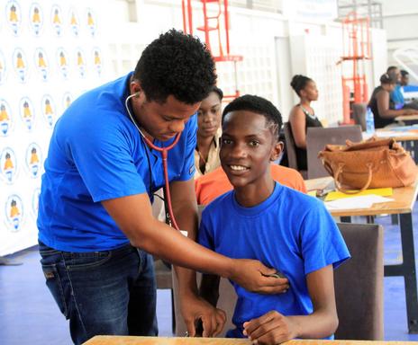 A doctor examines one of BAL’s youth