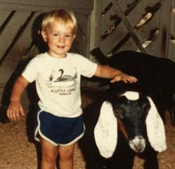 Colby's Army photo of Colby Keegan as a child with goat