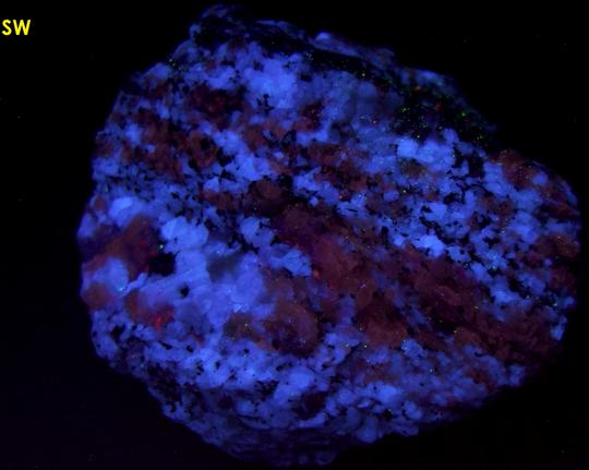 fluorescent SCAPOLITE and PLAGIOCLASE Albite-Anorthite, BIOTITE mica, CORUNDUM Sapphire - York River area, Dungannon Township, Hastings Co., Ontario, Canada