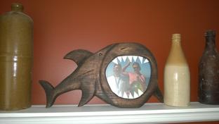 How to make a hand carved shark picture frame. Check out all of our nautical DIY craft ideas. www.DIYeasycrafts.com